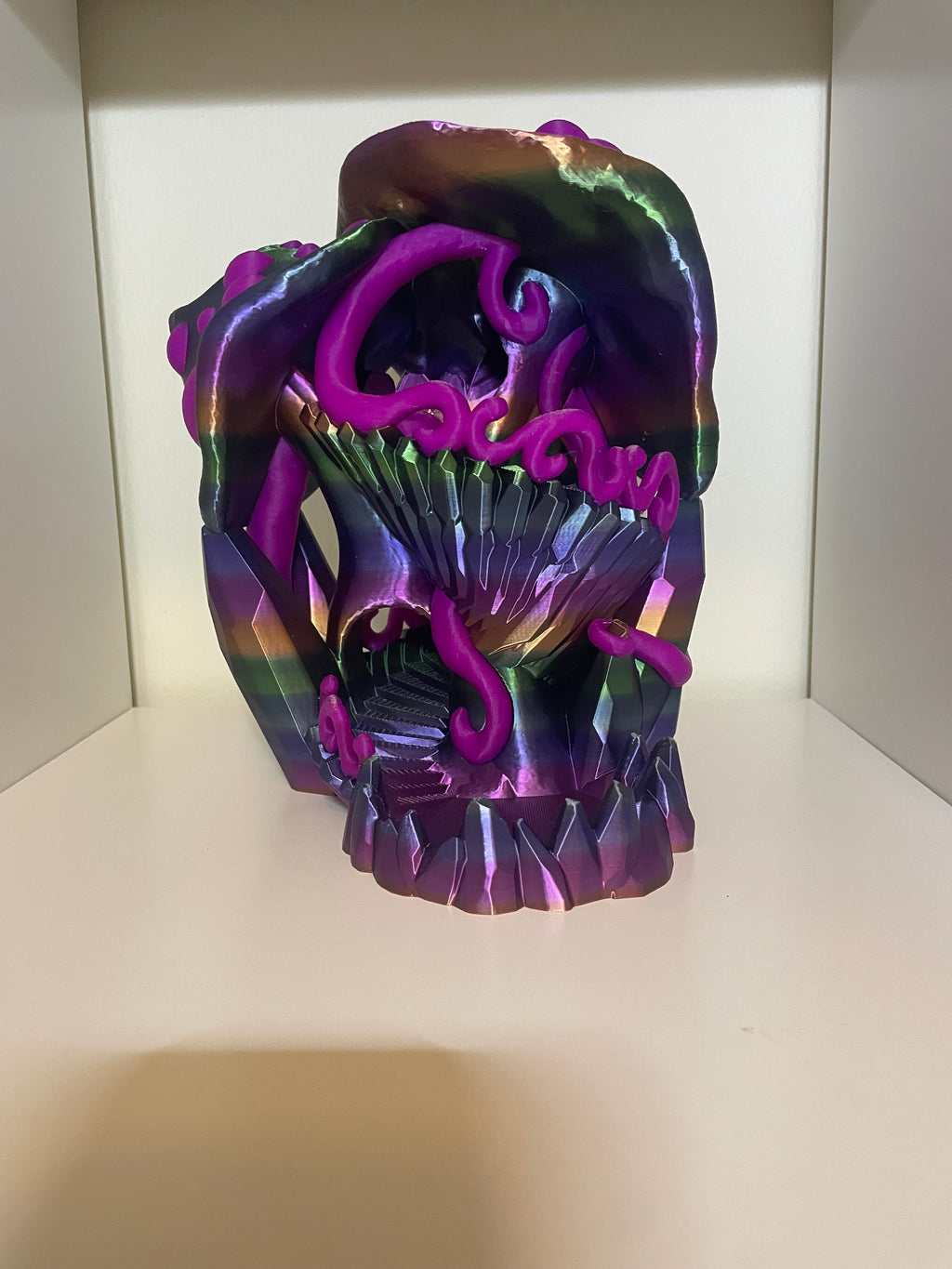 Front of dice tower, two toned. rainbow and glowing purple PLA filaments used for item.
