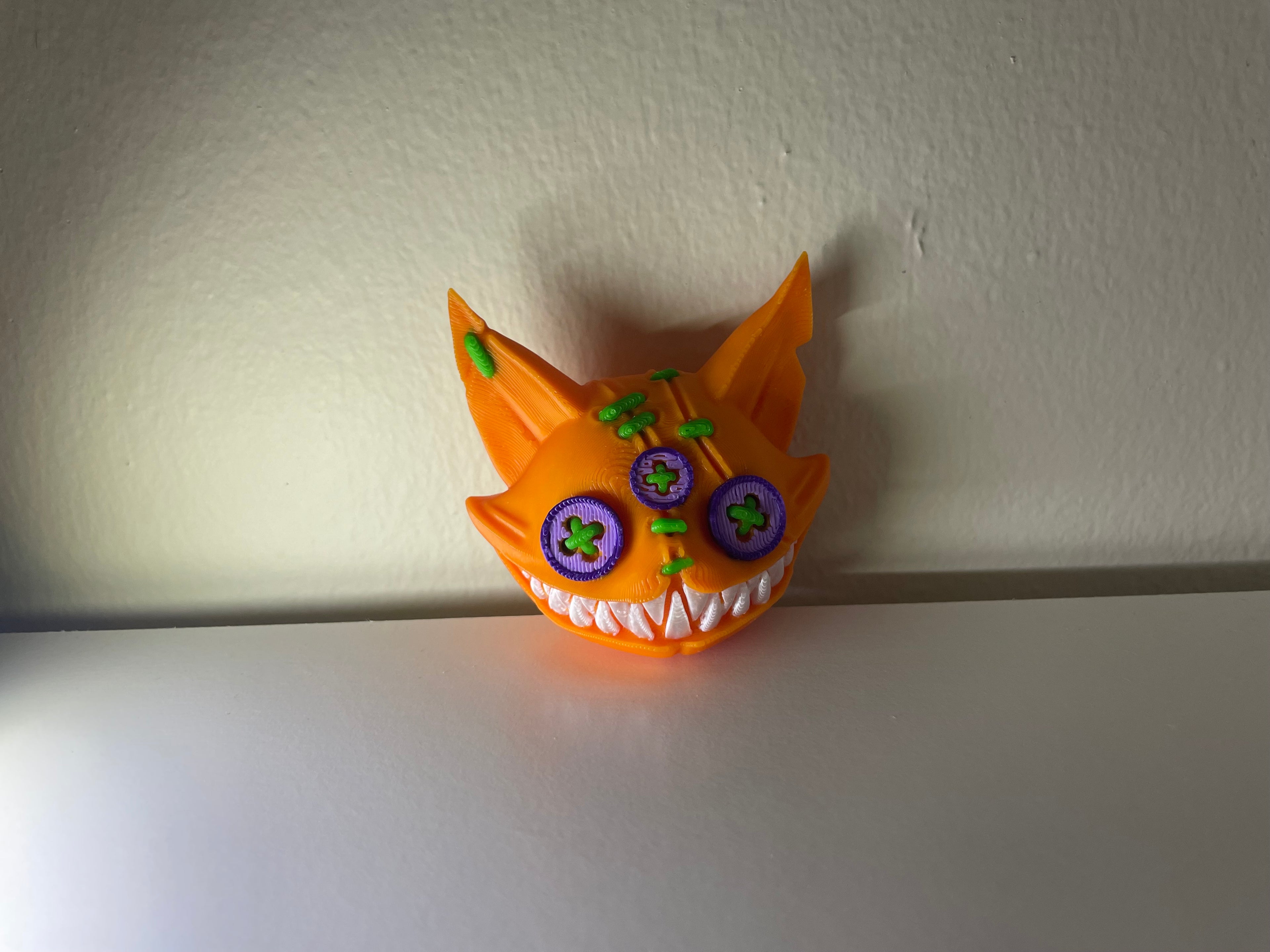 Twisty prints twisted cat magnet